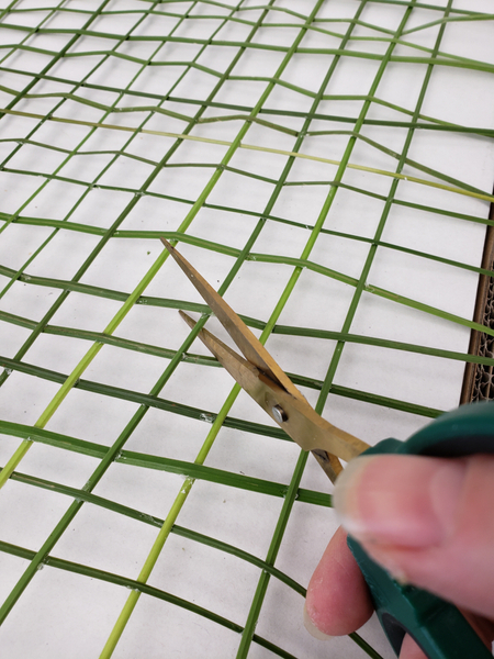 Glue the grid where it overlaps with a tiny dot of floral glue