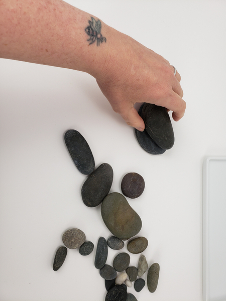 Pick a few pebbles that are easily stacked.