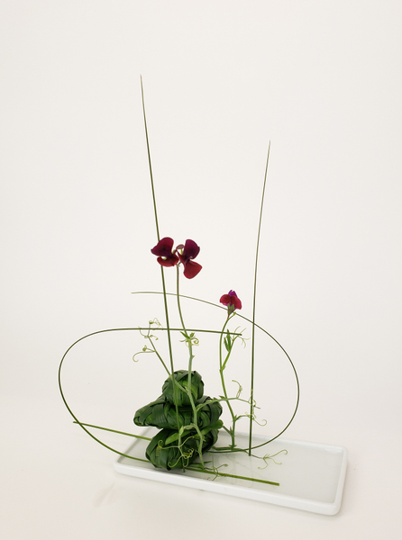 Using rocks in a flower arrangement