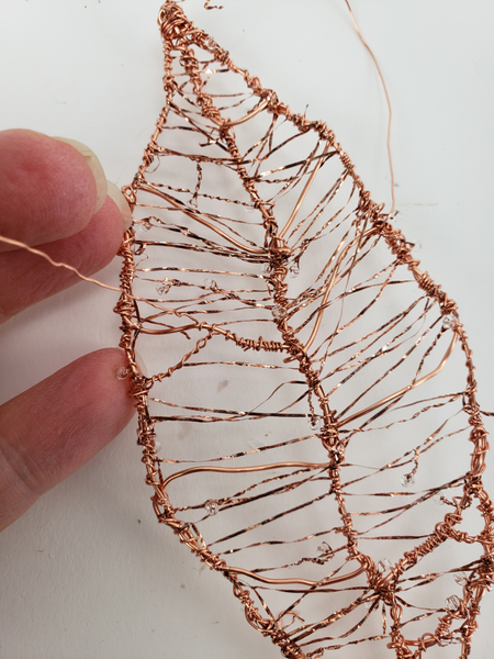 Finish the copper leaf by wrapping a few of the wires to create prominent veins