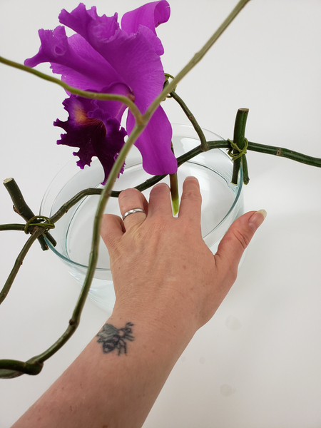 Play around with the balance to make sure the orchid stays in place