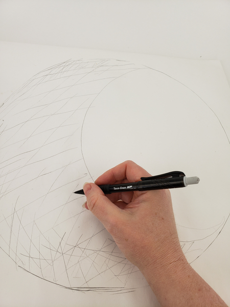 Cross hatch the outline to determine where you want the twigs to create a shaded area Cross hatch the outline to determine where you want the twigs to create a shaded area