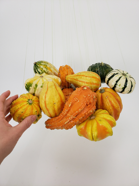 Hang all the pumpkins in a cluster