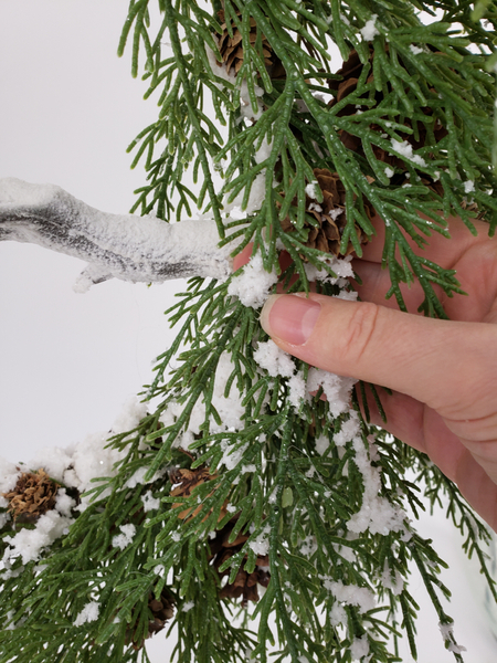 Conceal the wire with artificial snow Conceal the wire with artificial snow