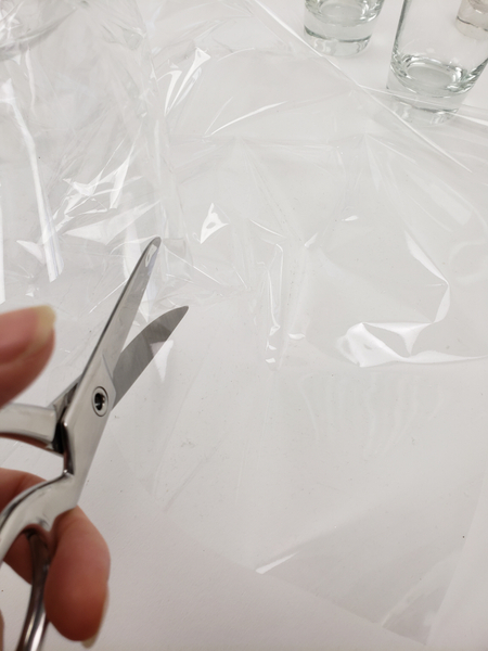 Cut a cellophane sheet into strips