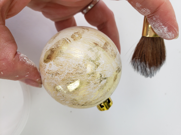 Paint the lightest dry brush strokes over the shiny bauble Paint the lightest dry brush strokes over the shiny bauble