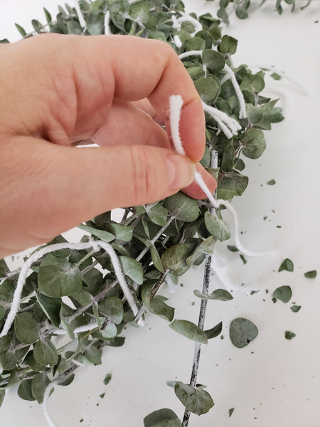 Make sure you tie each stem at three places to the rest of the wreath