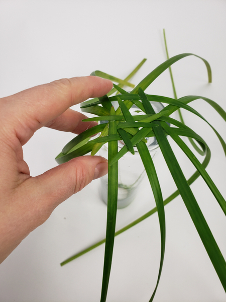 Leave a gap for the tulip stem in the grass weave