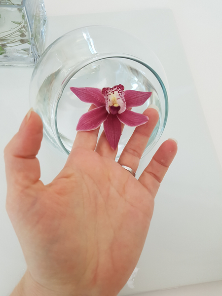 I also placed a single cymbidium orchid in the bowl