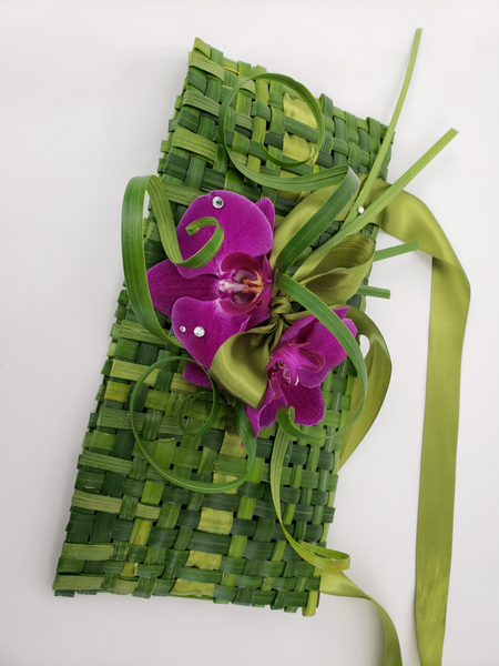 Lily grass and orchids floral design handbag