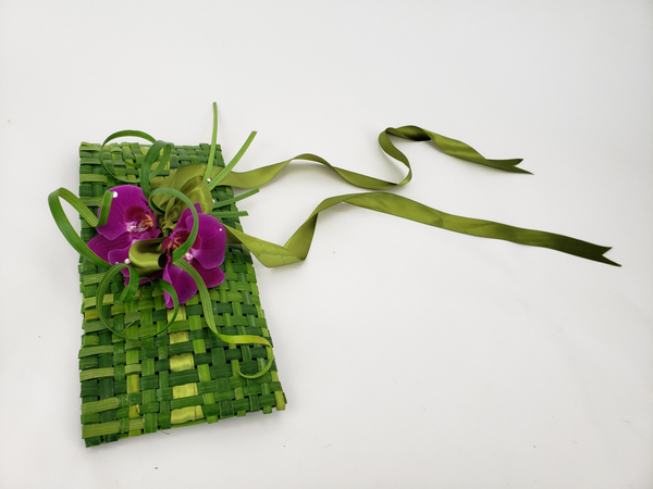 Make your own clutch purse from plant material and flowers
