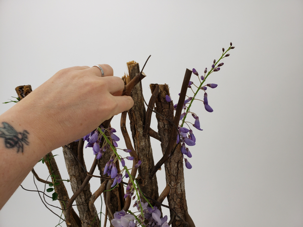 Place the flowers in the tubes so that is remains hydrated and fresh for as long as possible