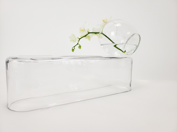 Arranging a single orchid spike in a clear glass design