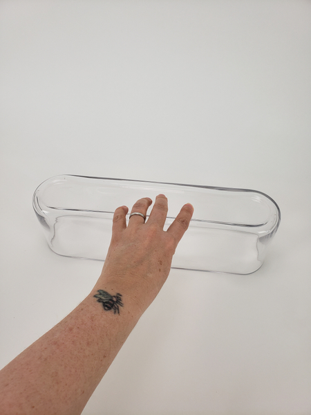 Place an oblong glass container upside down