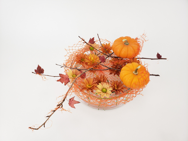 This season all the stylish pumpkins will be wearing them flower arrangement by Christine de Beer