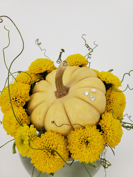 How to place a pumpkin in a floral design