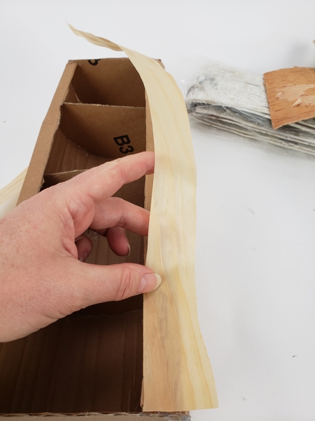 Cover the edge with Kyogi paper to create a wood veneer