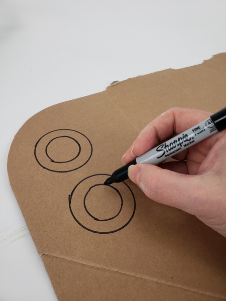 Draw circles onto cardboard