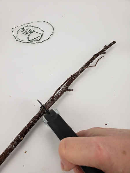 Measure and cut a few support twigs