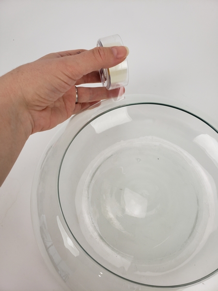 Tape a clear sticky tape grid over the vase