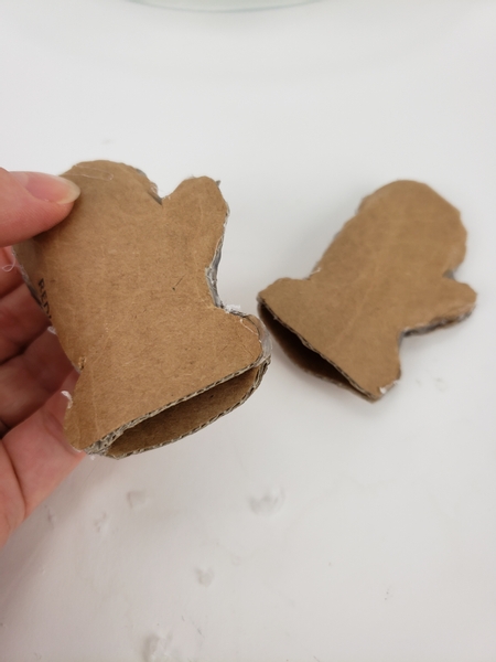 The cardboard mittens are now ready to decorate