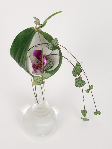 Sheltered bud vase design