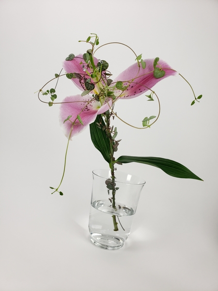 Single lily flower design by Christine de Beer