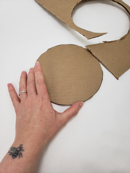 Cut a small circle out of cardboard