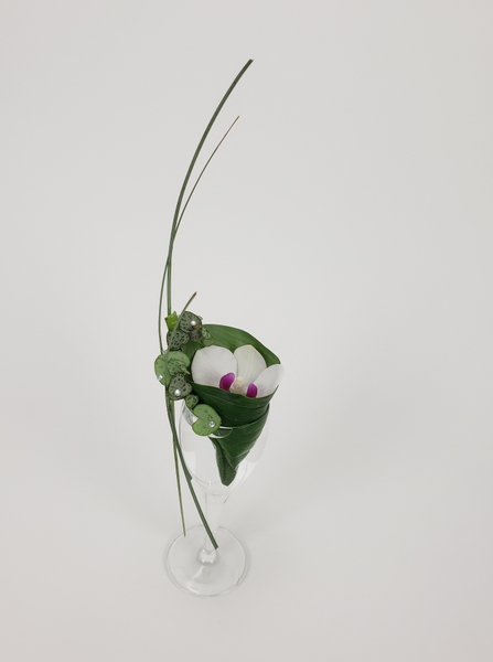 A scoop of pretty flower arrangement by Christine de Beer