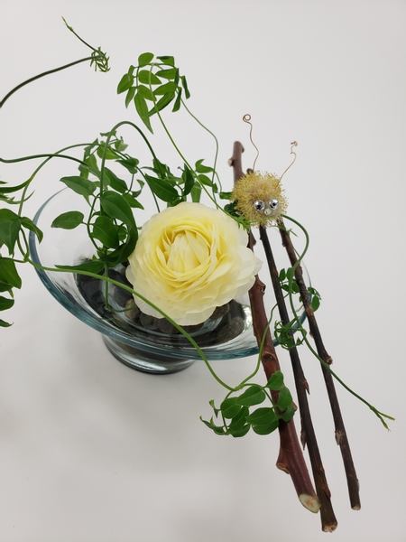 Buttercup and pussy willow flower arrangement