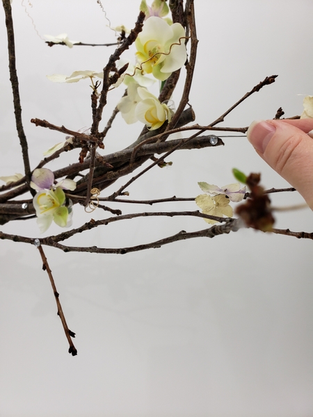 Place a few dew drop crystals into the wreath