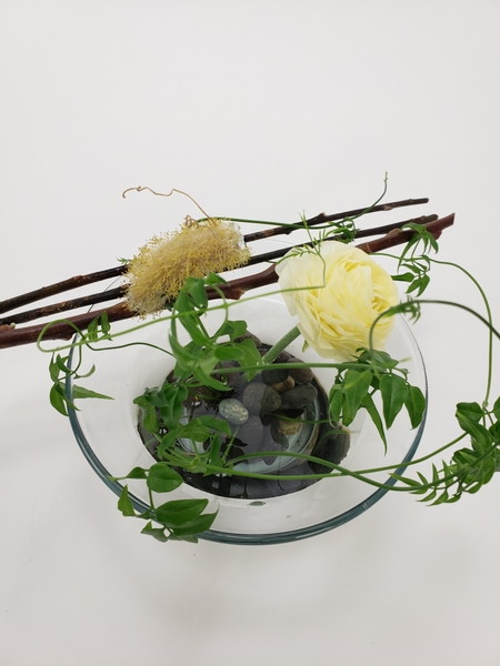 Using a kenzan in contemporary zero waste no floral foam flower arrangements