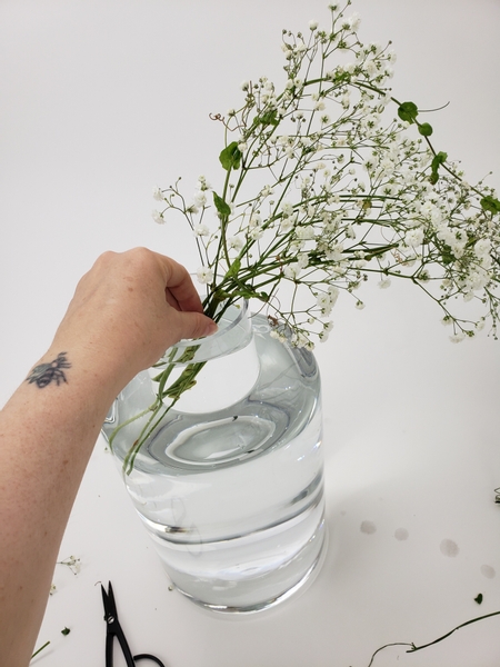 Place the stem bundle at an angle in the container