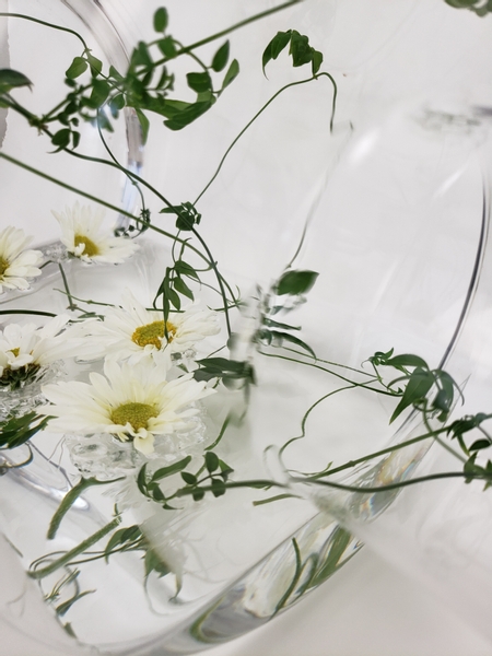 Float flowers in a bottle with a bubble wrap raft skirt