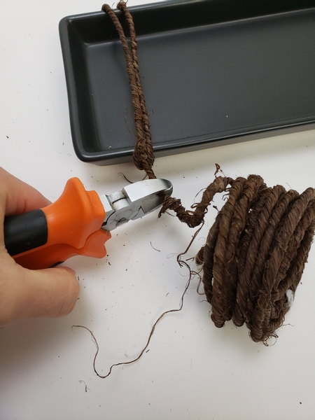 Cut the wire short and twist the ends to secure