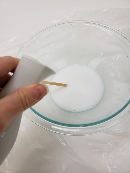 Thin the glue with warm water