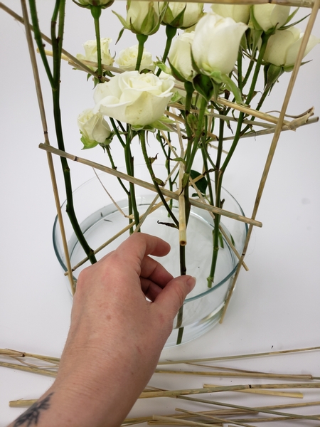 And add a few spray roses into the the gaps And add a few spray roses into the the gaps