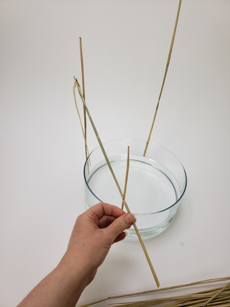 Start to build up the ghost ship shape by connecting the wheat stems