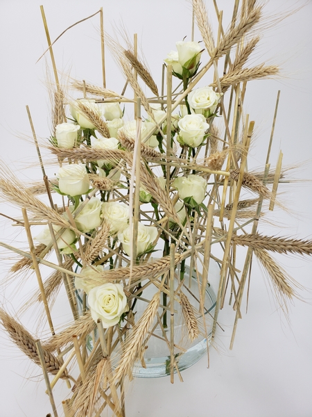 Wheat and roses floral design