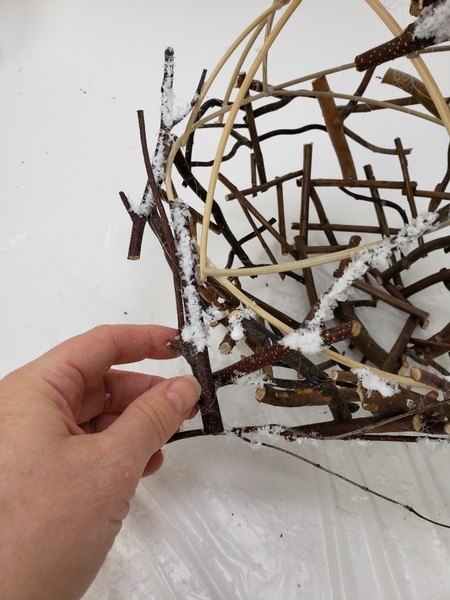 And glue in a few twig snippets to break up the bowl shapes