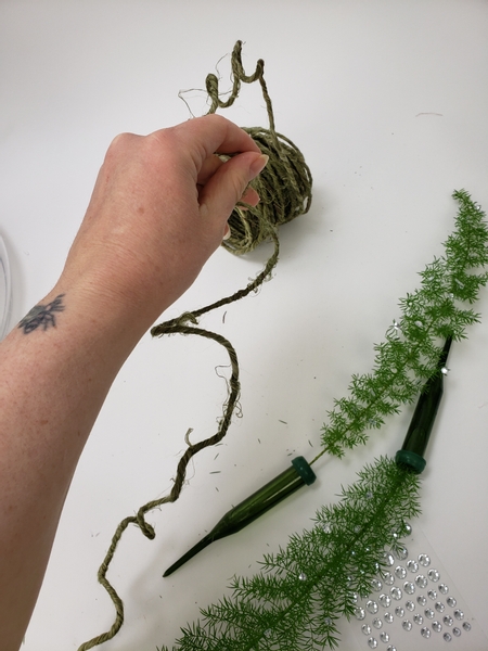 Curl and curve bark wire to give shape to the garland