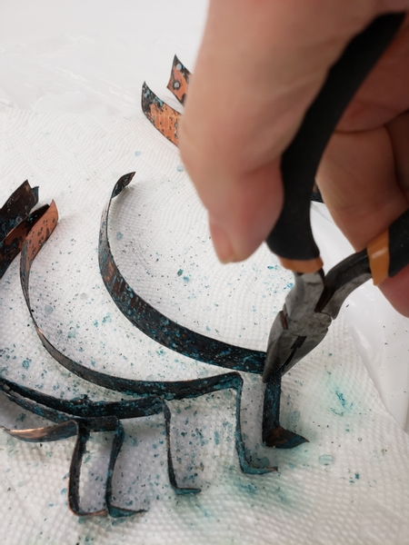Curve the rest of the strips with your pliers