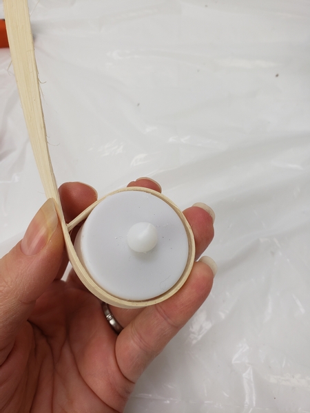 Wrap cane around a votive candle to measure the end pieces