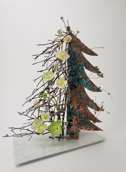 It’s the most… it’s the most… wonderful Patina Copper Christmas Tree of all floral art design by Christine de Beer