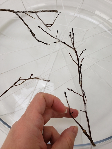 Build up on the wool grid to create a pretty twig design