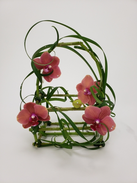 Carry On floral basket design by Christine de Beer