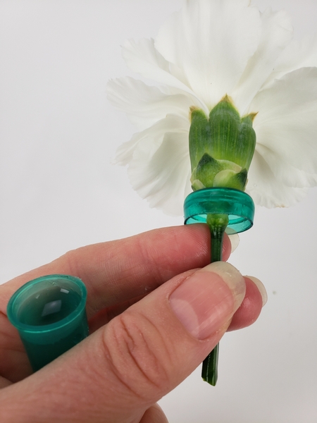 Measure out the flower you want to place into the cone so that it fits perfectly
