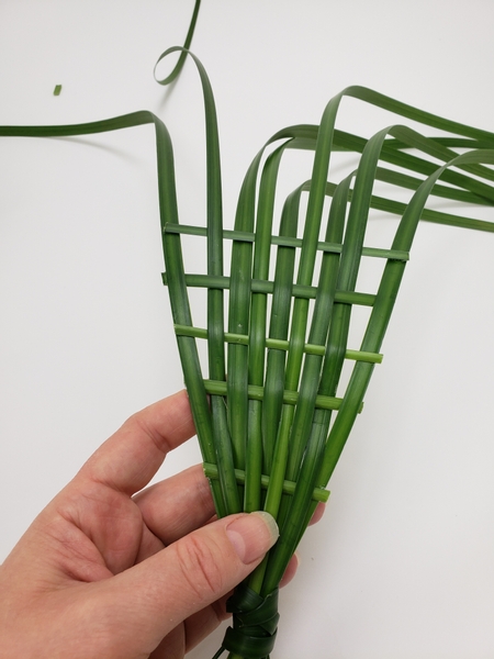 You can secure the grass with the tiniest bit of floral glue if you wan them to stay absolutely perfectly straight You can secure the grass with the tiniest bit of floral glue if you wan them to stay absolutely perfectly straight