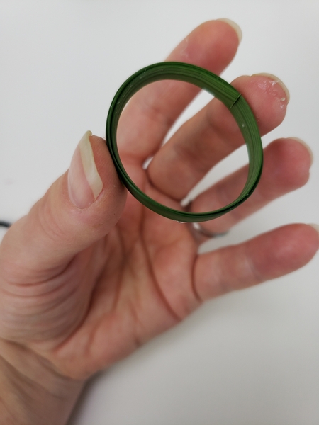 Secure the circle of grass with glue