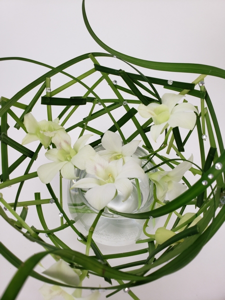 Sustainable floral art design using off cut plant material.